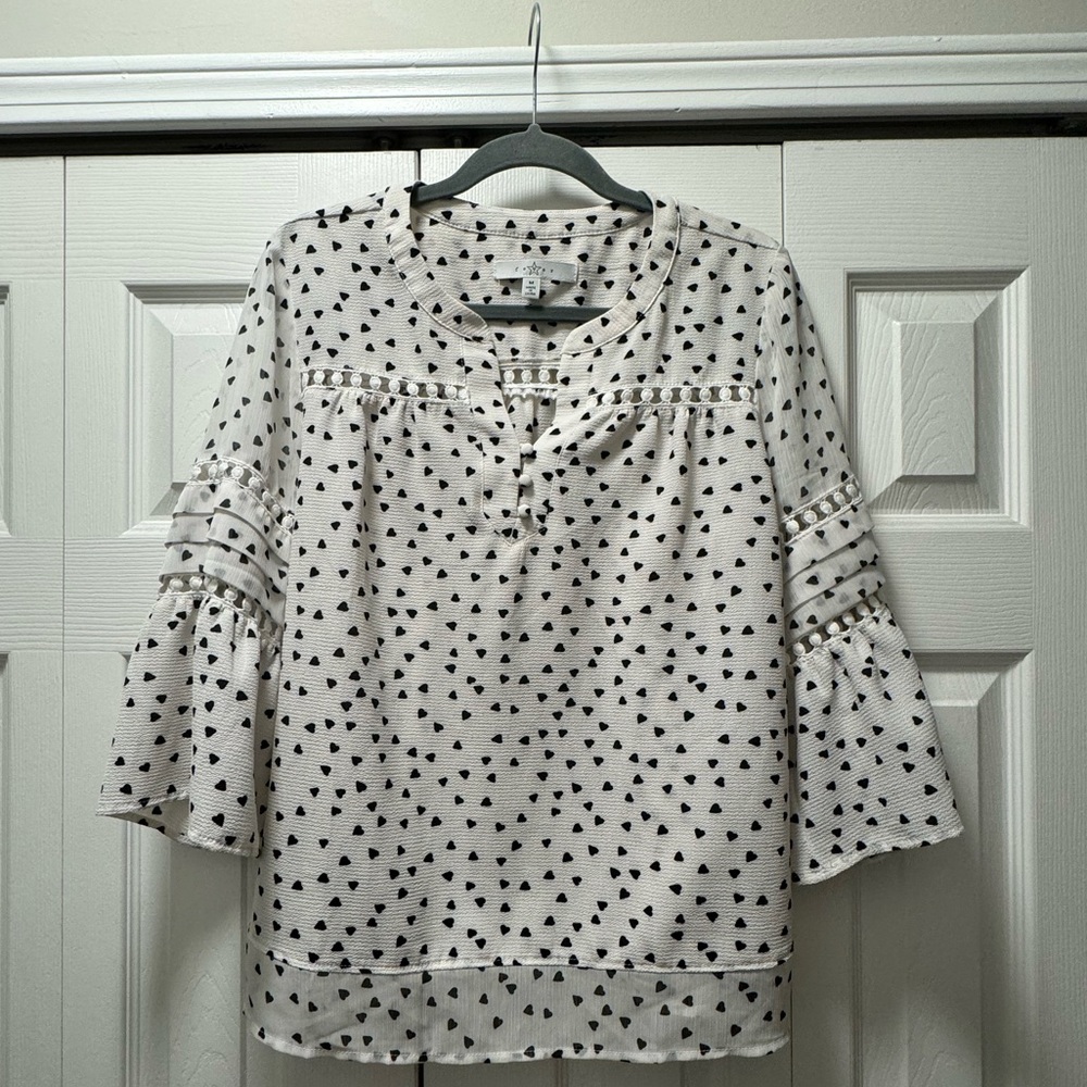 White blouse with black hearts
